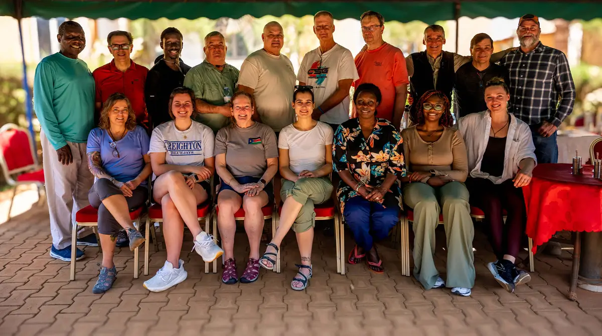 A young, new DJ putting on a show with his records.